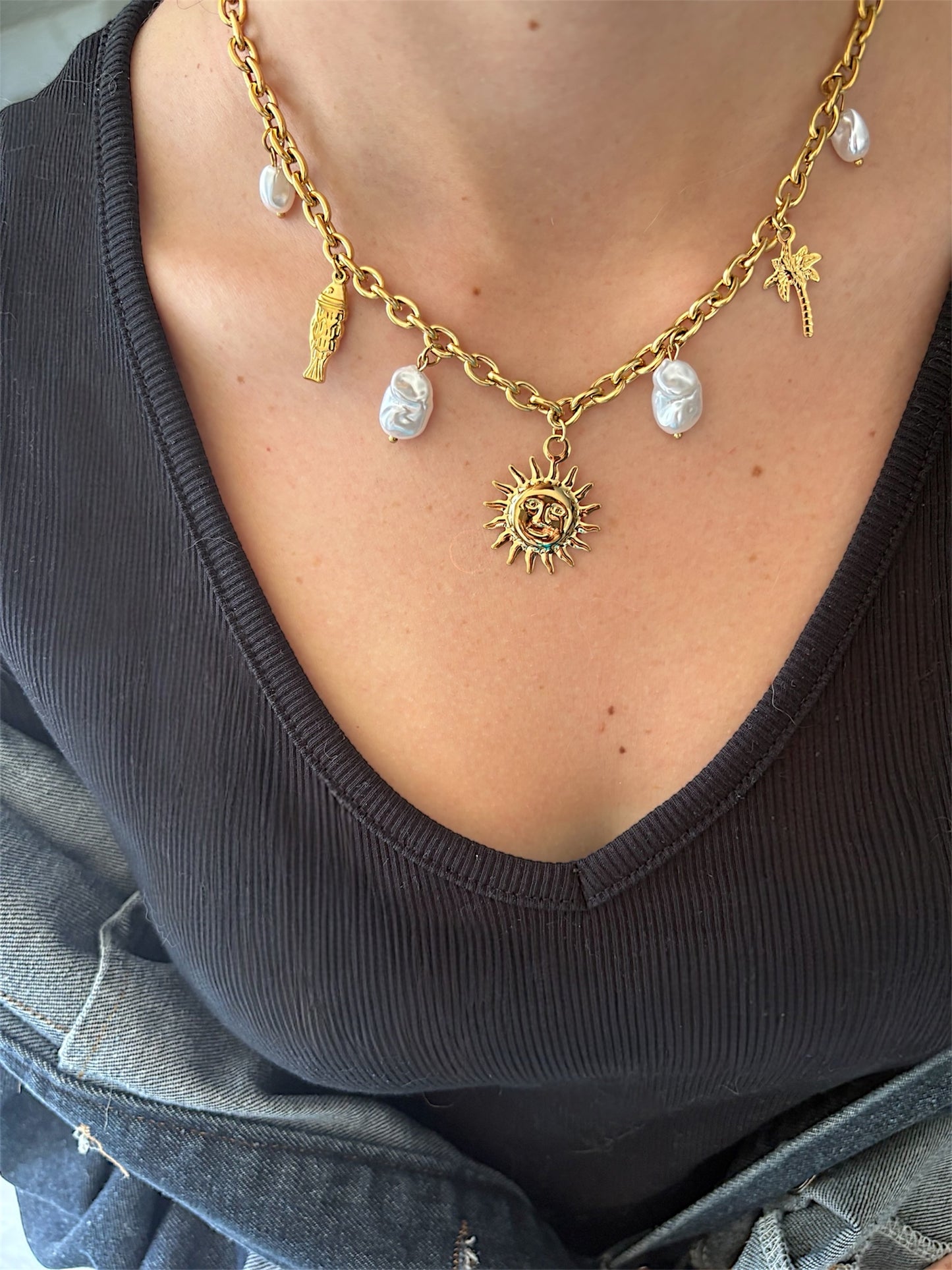 Collier breloques soleil